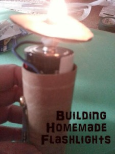Building a homemade flashlight for Girl Scout Junior Get Moving Energy Journey. Great STEM activity for scouts.