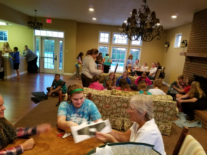 Smores and service night for girl scouts: making shoes for sole hope